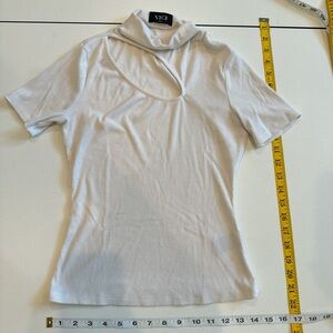 NWOT Vici White Short Sleeve Top with asymmetrical peephole neckline